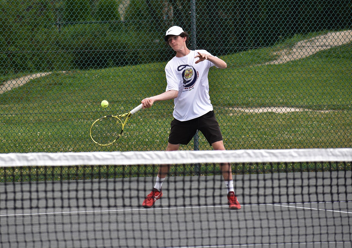 Josh Embree hits a forehand during the Sandpoint tennis camp on Friday.