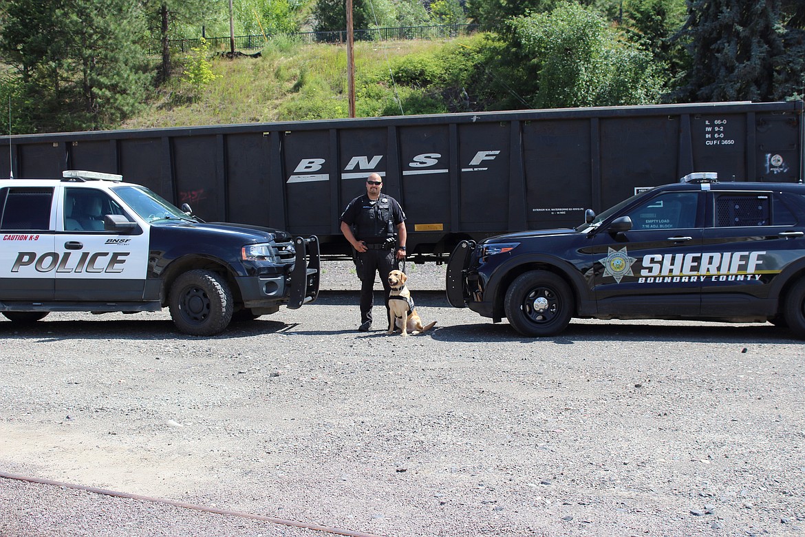 (Photo by VICTOR CORRAL MARTNEZ)
Boundary County Sheriff’s Offic Cpl. Michael Valenzuela, poses with the department’s new K-9 officer, Buddy.