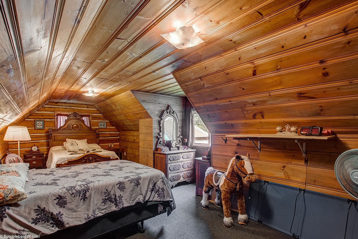 This is one of four lofty bedrooms in the St. Joe Lodge, which is now for sale. The lodge, 5,218 square feet on 1.38 acres between St. Maries and Avery, is an ideal spot for a bed and breakfast or restaurant in the country.