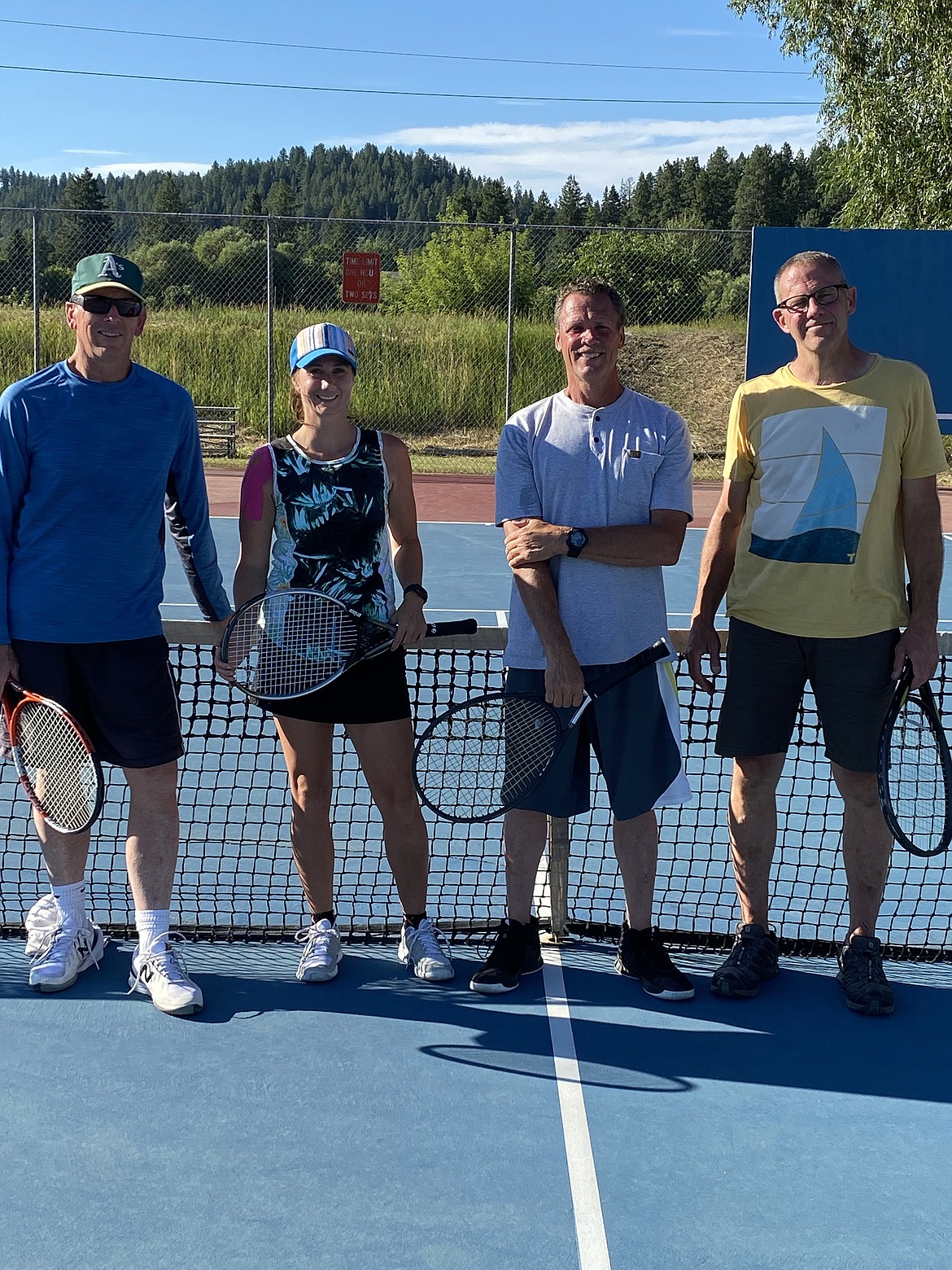 Boundary County Tennis Association singles championship semifinalists John Beck, Cynthia Franke, Scott Fontenot and Francis Danielek pose for a photo.