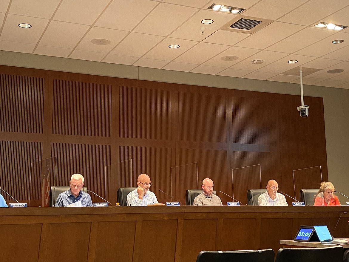 Post Falls City Council members and Mayor Ron Jacobson meet at City Hall to discuss various city issues. From left Councilor Steve Anthony, Mayor Ron Jacobson, Councilor Joe Malloy, Councilor Alan Wolfe, Councilor Kerri Thoreson.