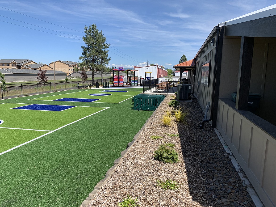 After shot of the Black Bay Depot back area, including the sports turf, train-themed playground and exterior detailing. (Photo by David Fair)