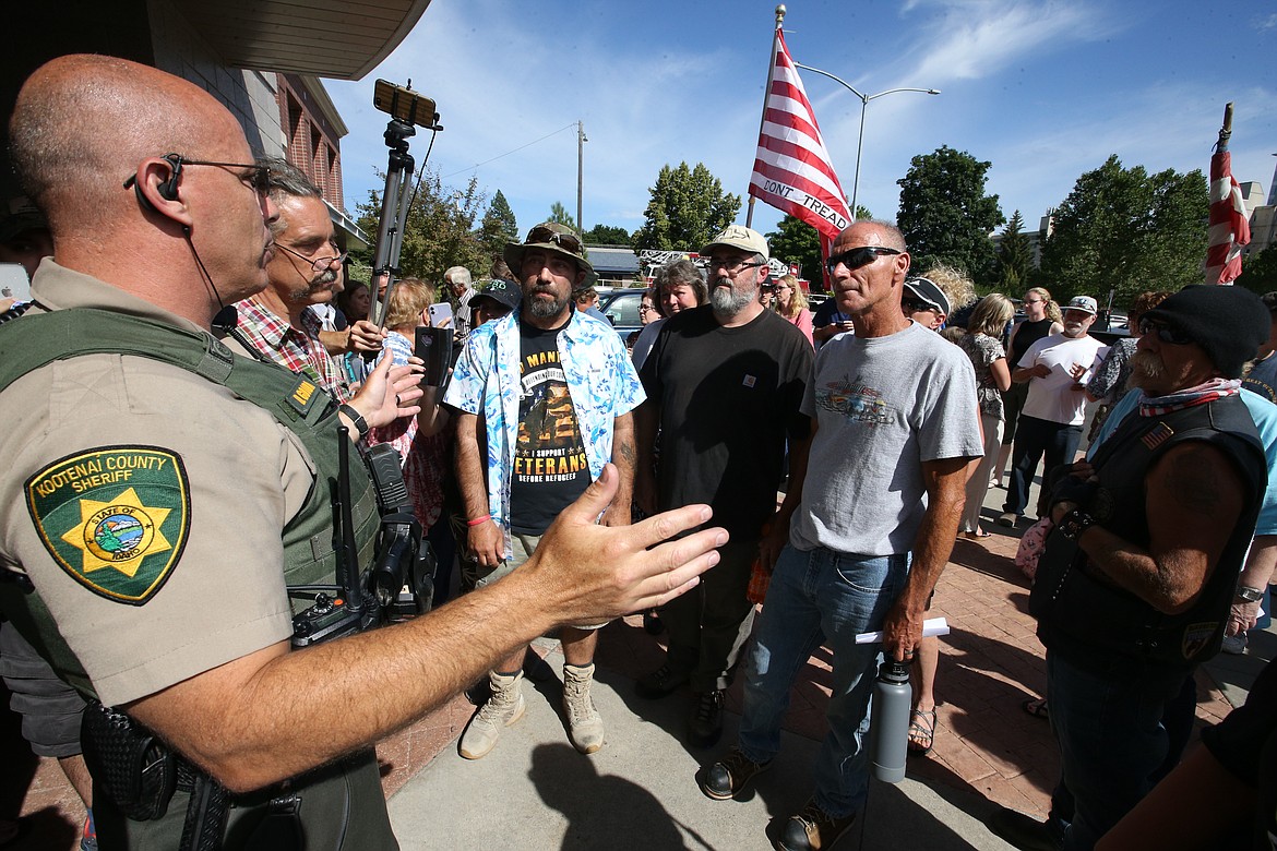 Kootenai County Sheriff’s Deputy Doug Goodman spoke to the crowd after the mandate was approved.