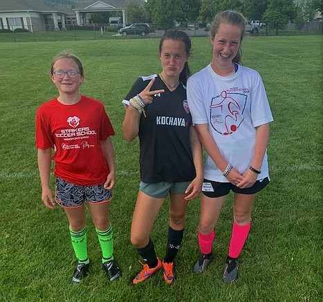 From left: Avery Inges, Grace Matt and Lilliana Brinkmeier were named Premier 2 of the Day at the Sandpoint Strikers summer camp on July 16.
