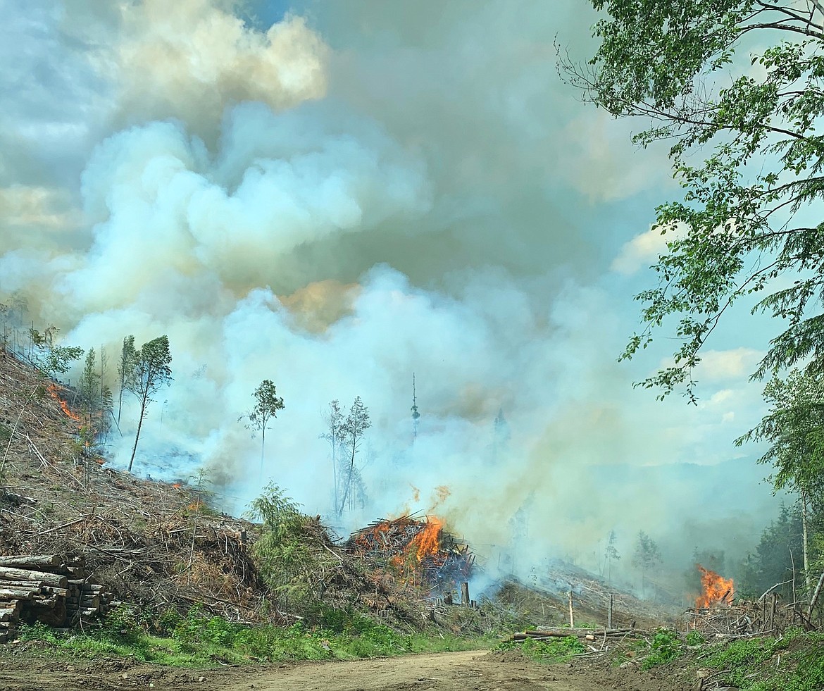 A fire roars on the back side of Spirit Lake on July 3. From May 10 to Oct. 20, everyone in the woods is expected to have a shovel and bucket handy, as well as spark arresters on their recreational vehicles, to prevent forest fires.