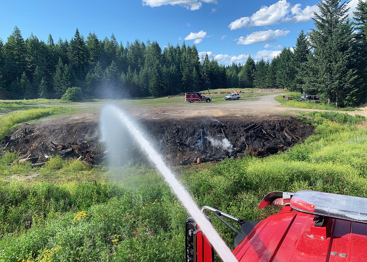 A Timberlake Fire apparatus sprays down Farragut State Park on July 13, 2020. With the heat advisory and dry weather this week, fire officials have offered tips for staying safe, including bringing a fire extinguisher when camping and making sure chains don't drag on roadways. (Photo courtesy of Timberlake Fire)