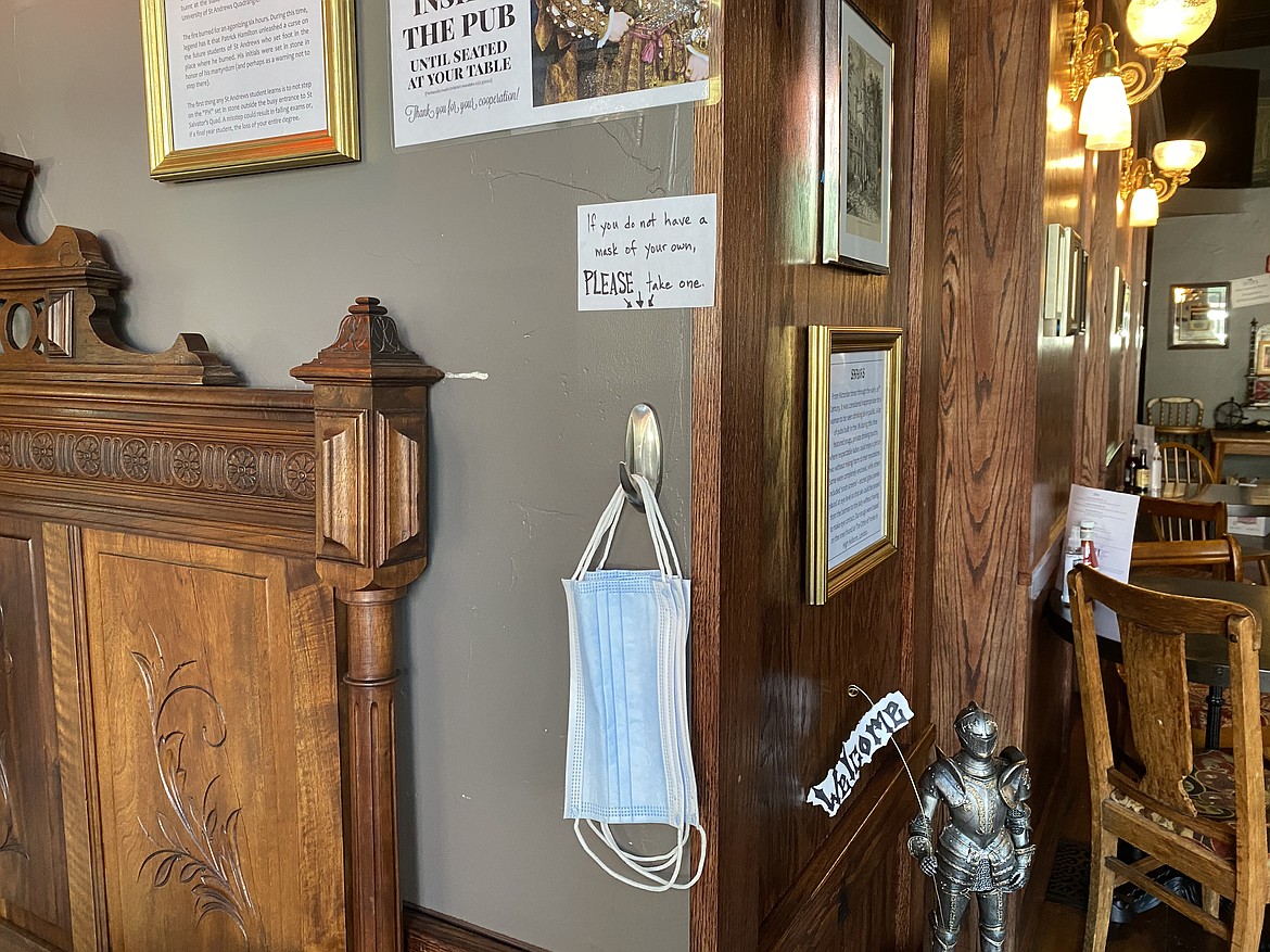 The Crown and Thistle Pub requires patrons to wear masks while ordering, and offers customers disposable masks at the door.