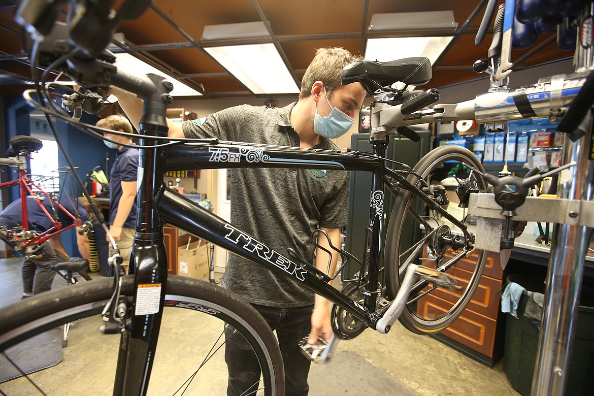 Jimmy Boland works on a bike at Mountain View Cyclery.