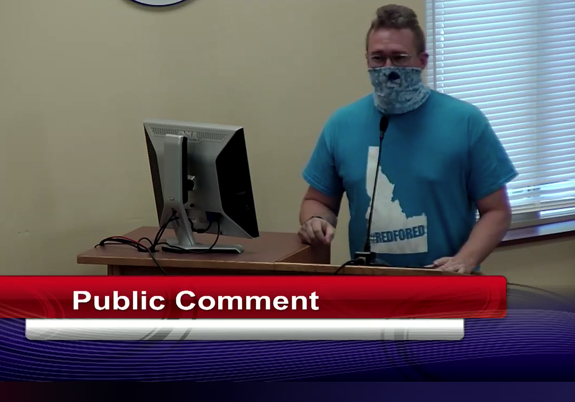 Coeur d’Alene High photography teacher Bruce Twitchell shares his insight about problems that could arise for teachers and students if only some students go to school in person and others go online as he addresses the Coeur d’Alene School Board on Monday. He recommends going completely online until at least the first part of the year.