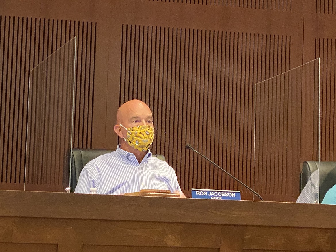 Mayor Ron Jacobson wears face covering during city council meeting Tuesday.