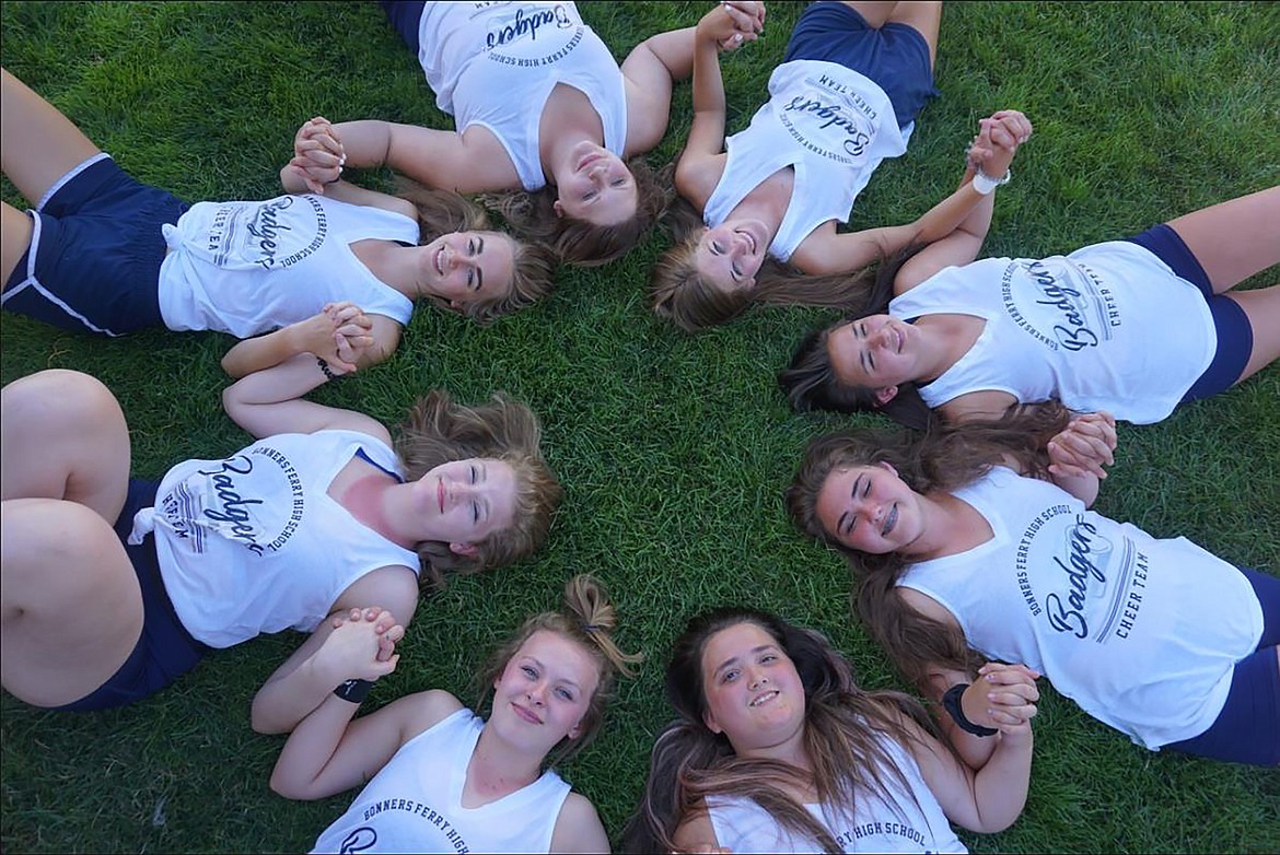 Bonners Ferry High School cheerleaders take a moment for a photo. Pictured are Kylie Underhill, Bella Sims, Gena Kelsey, Hailey Kelsey, Kynsie Hinrichs, Addy Heigel, Kylie Callahan, and Ember Allred.