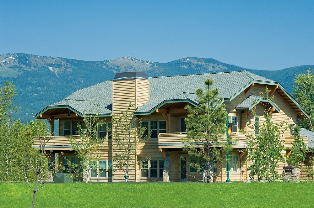 Photo courtesy of DOVER BAY DEVELOPMENT 
 A building in Bayside South, touting incredible views of the surrounding mountains.