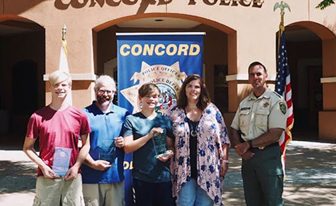 (Courtesy photo)
Shane O’Hara, Kelly O’Hara, Max O’Hara and Liz O’Hara were honored in Concord, Calif., for coming to the rescue of boaters who capsized on Lake Pend Oreille on June 24. Bonner County Marine Deputy Leroy Bloxom, who also participated in the rescue, was on hand for the recognition ceremony on Aug. 2.