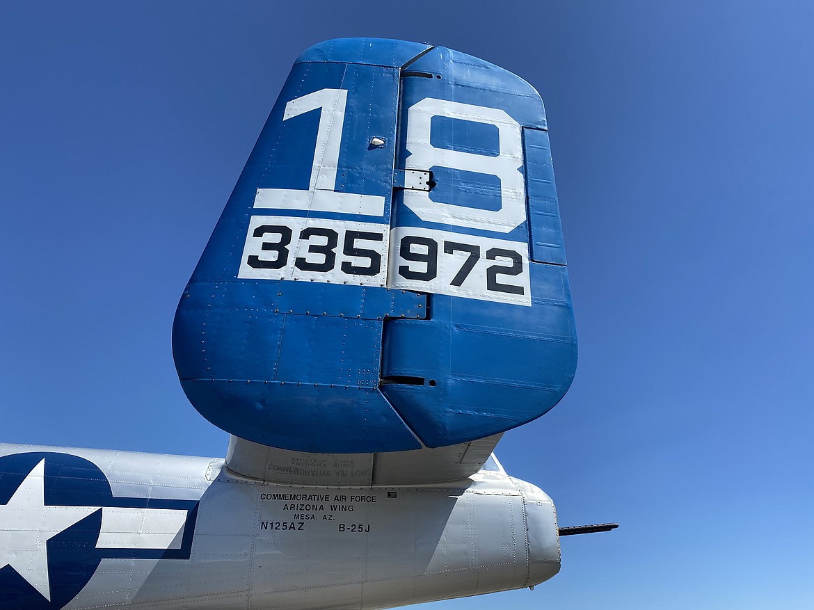 B-25J Mitchell warplane "Maid in the Shade" features restored painting on exterior, including her bright blue battle number 18 tail. (MADISON HARDY/Press)