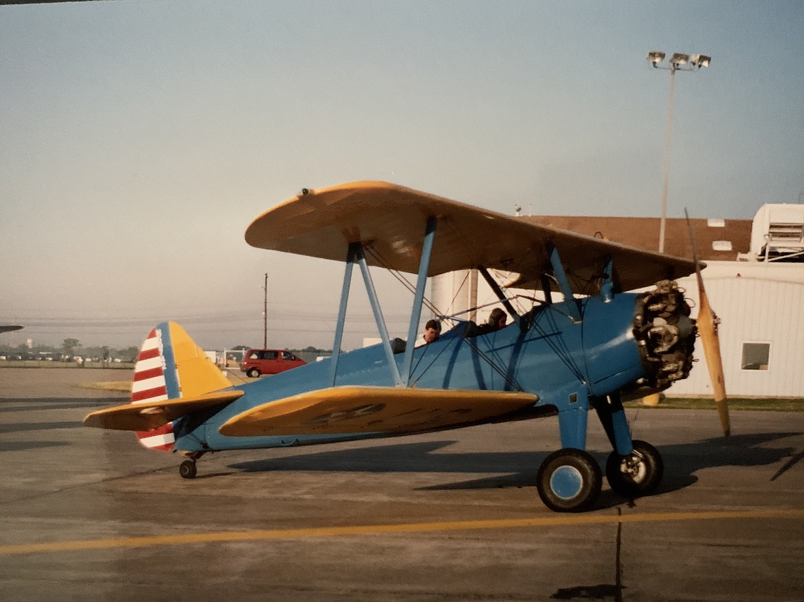 The cool flying ace herself in a Stearman over 20 years ago.