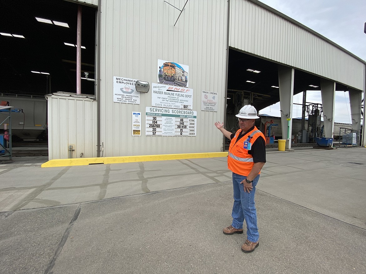 John Jeffery, the Hauser Fueling Depot maintenance and compliance manager, shows off the facilities scoreboard which tracks BSNF locomotive details. (MADISON HARDY/Press)