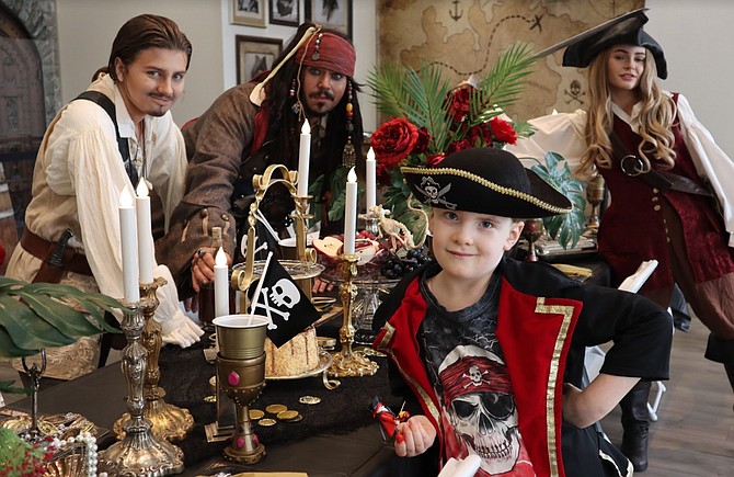 Actors portraying the “Pirates Of The Caribbean’s” Will Turner, Jack Sparrow and Elizabeth Swann swashbuckle alongside partygoer Aiden Branson for Dreams Are Forever’s grand opening in May. The event company that specializes in themed party appearances has had to make several adjustments since COVID-19 struck.