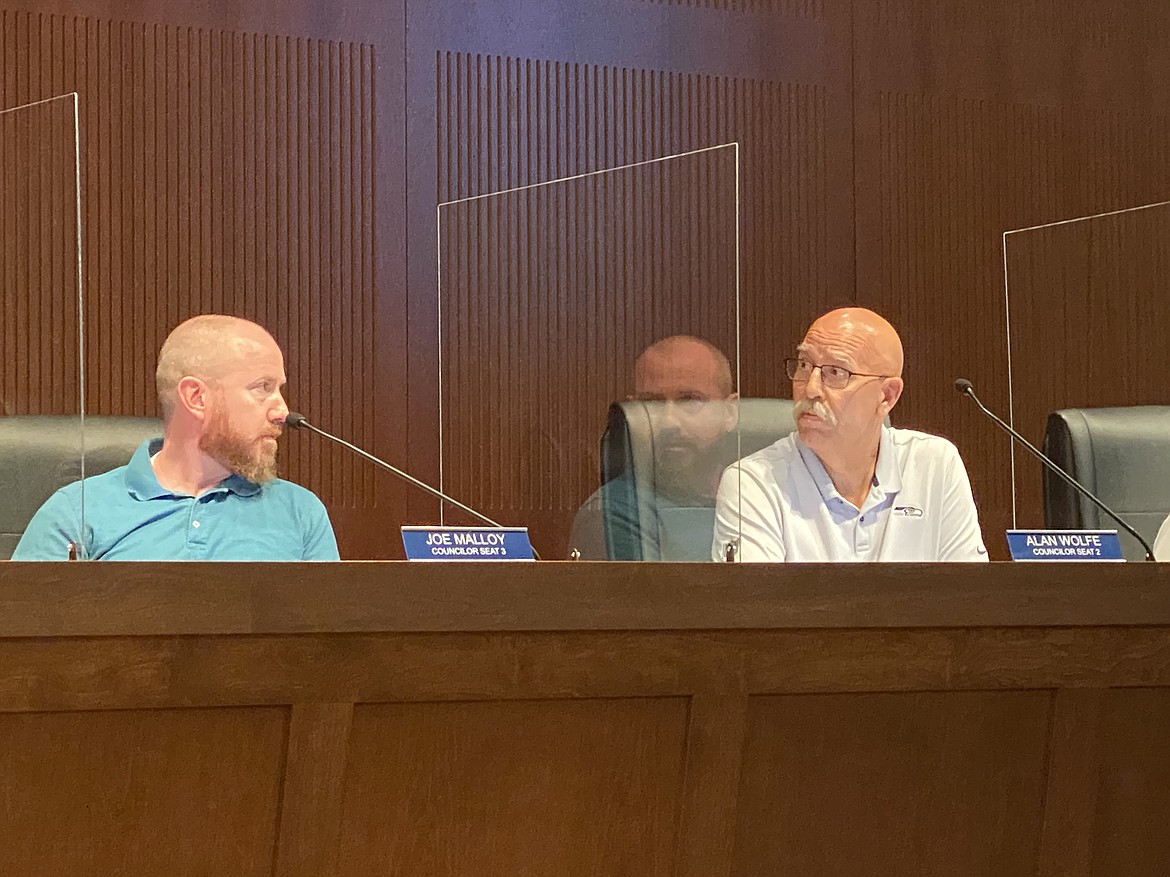 Post Falls City Council discussed many issues in last night's meeting including the CARES Act and fee increases. From left Councilor Joe Malloy and Councilor Alan Wolfe. (MADISON HARDY/Press)