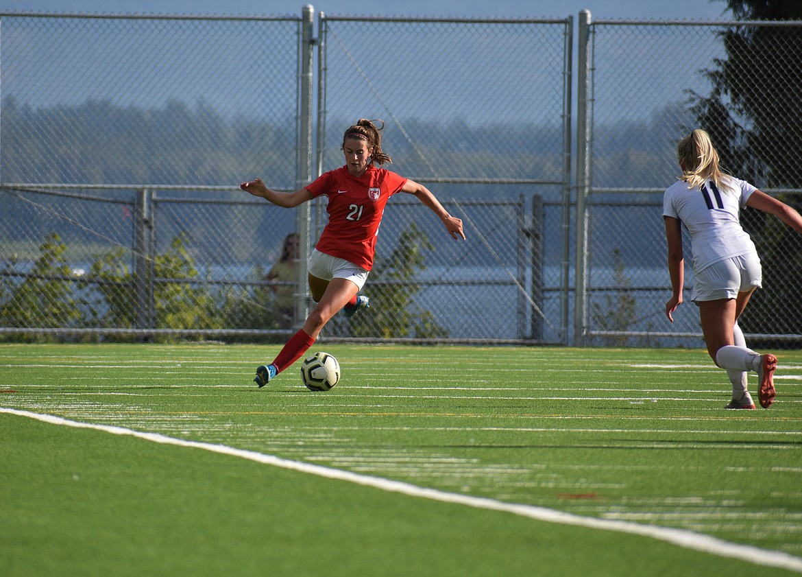 (Photo by DYLAN GREENE) 
 Junior Piper Frank tries to play a ball downfield on Friday.