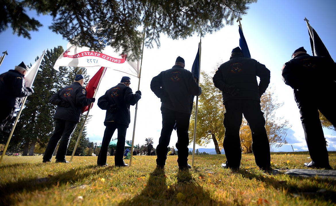 Members of the United Veterans of the Flathead stand at attention and serve as the color guard at the funeral of Maj. Gen. Neil Van Sickle on October 22, 2019 in C.E. Conrad Memorial Cemetery in Kalispell. Van Sickle will be honored on Memorial Day this year as the United Veterans of Flathead Valley raise a flag in his honor. (Brenda Ahearn/Daily Inter Lake FILE)