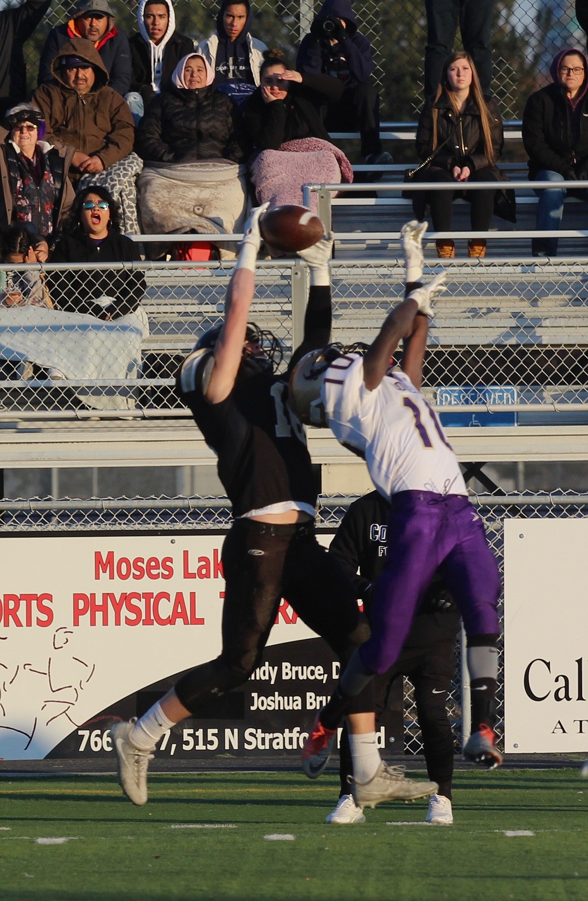 Casey McCarthy/Columbia Basin Herald Tyler Allred goes up to make the catch over the Connell defender on the sideline in the first half of the Knights’ 42-0 victory.