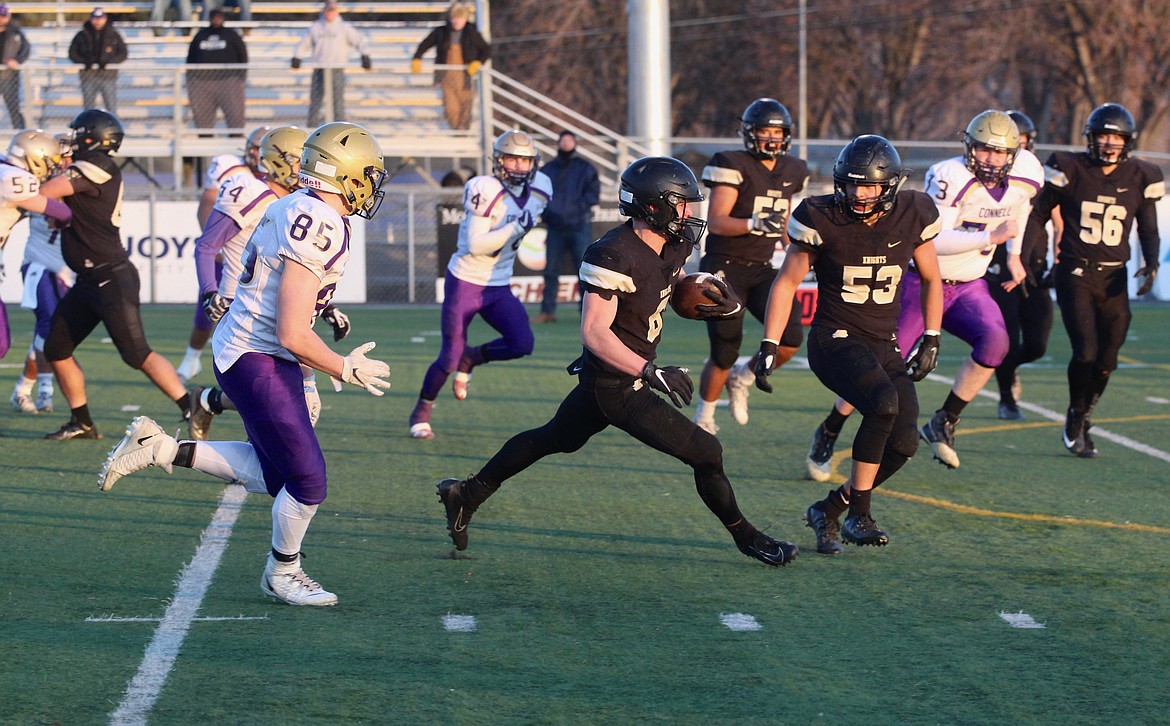 Casey McCarthy/Columbia Basin Herald Royal’s Derek Bergeson fights his way in for the pick-6 to build the lead for the Knights in the second quarter.