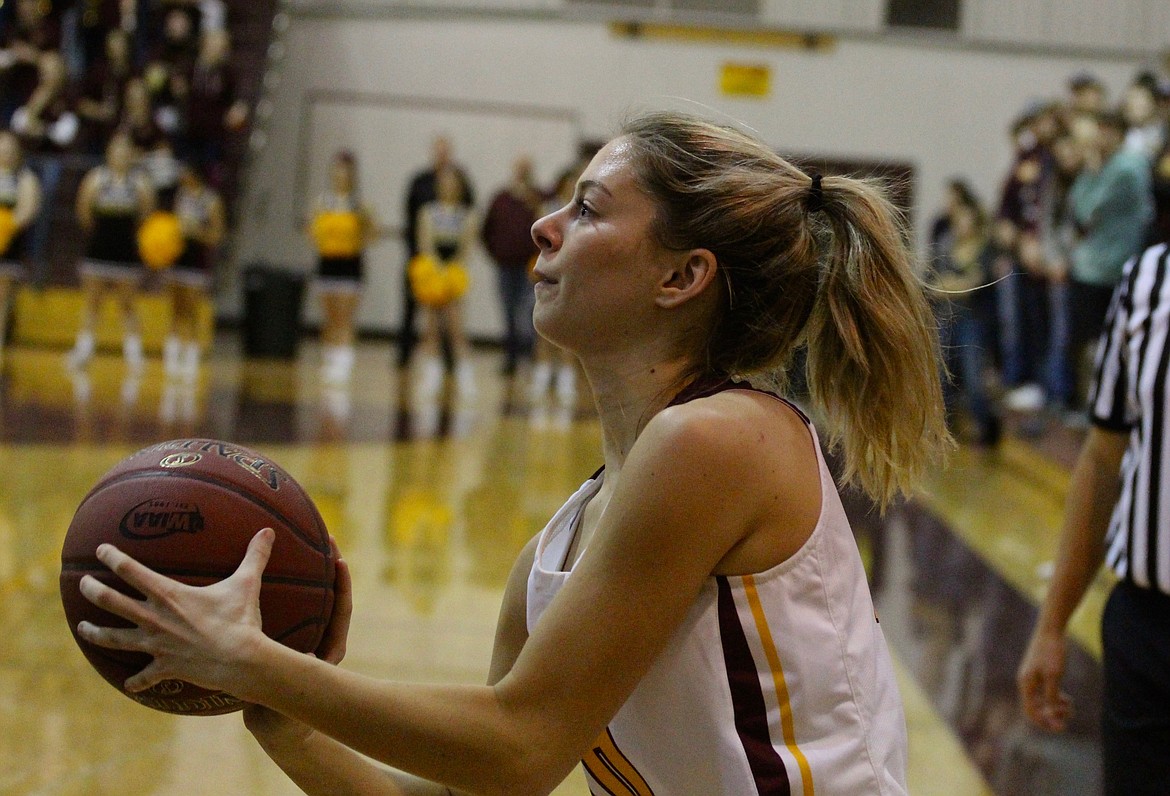 Casey McCarthy/Columbia Basin Herald Moses Lake’s Anna Olson takes the corner three in the first half of the Chiefs’ 66-64 win over Mt. Spokane to begin the season.