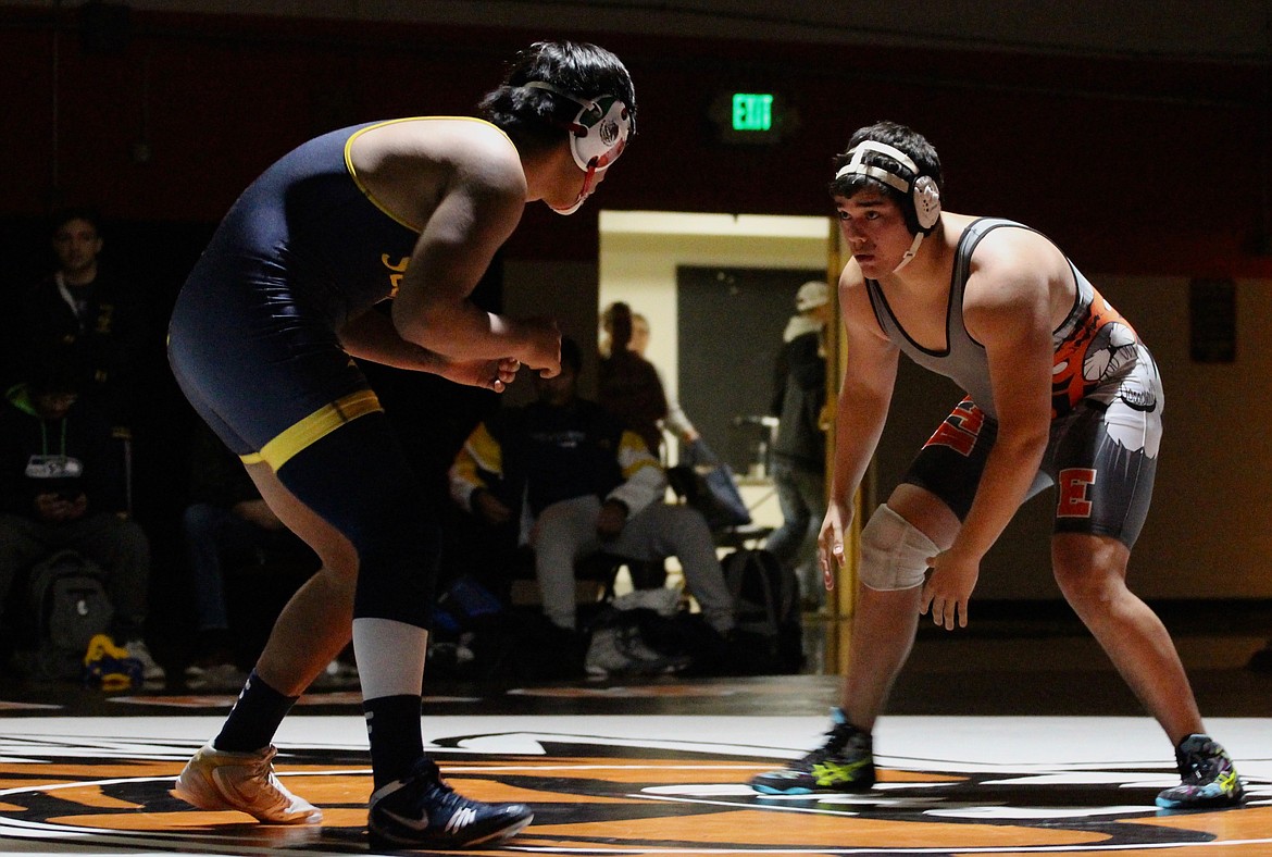 Casey McCarthy/Columbia Basin Herald Kevin Pelayo and his matchup in the bout at 220 size each other up as both look to circle in for the attack on Thursday night in Ephrata.