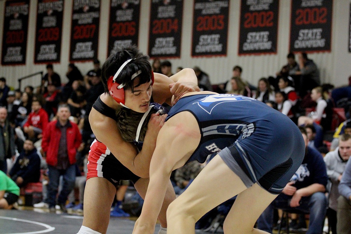 Casey McCarthy/Columbia Basin Herald Jaxon Rocha looks to over power his opponent in the ring on his way to a first-place finish in the 145 division on Saturday.