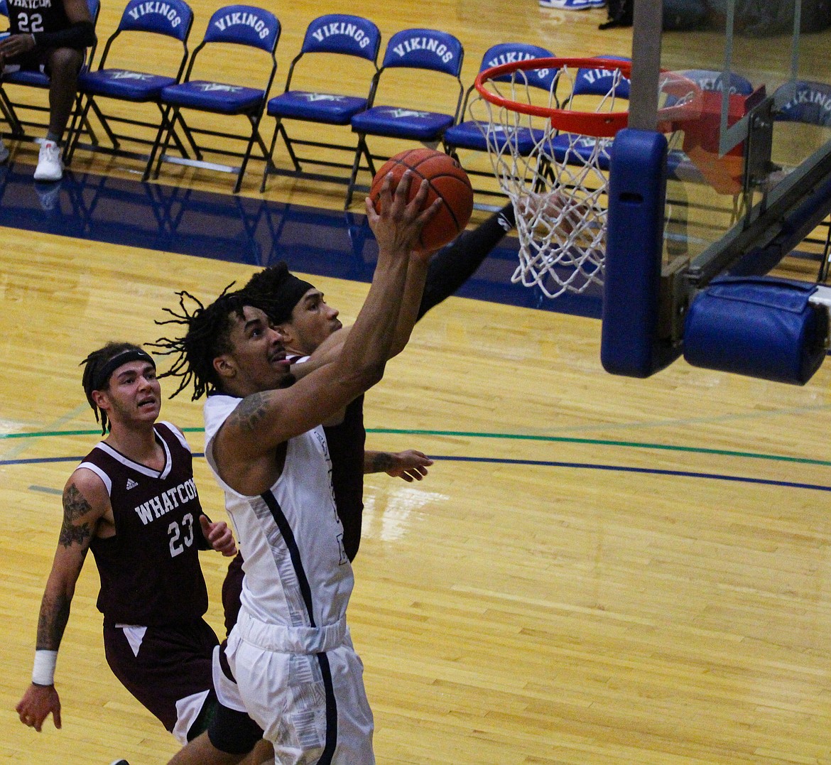 Jahvontae’ Jones flies in for the layup in the first half of the Runnin’ Vikes win over the Orcas on Wednesday.