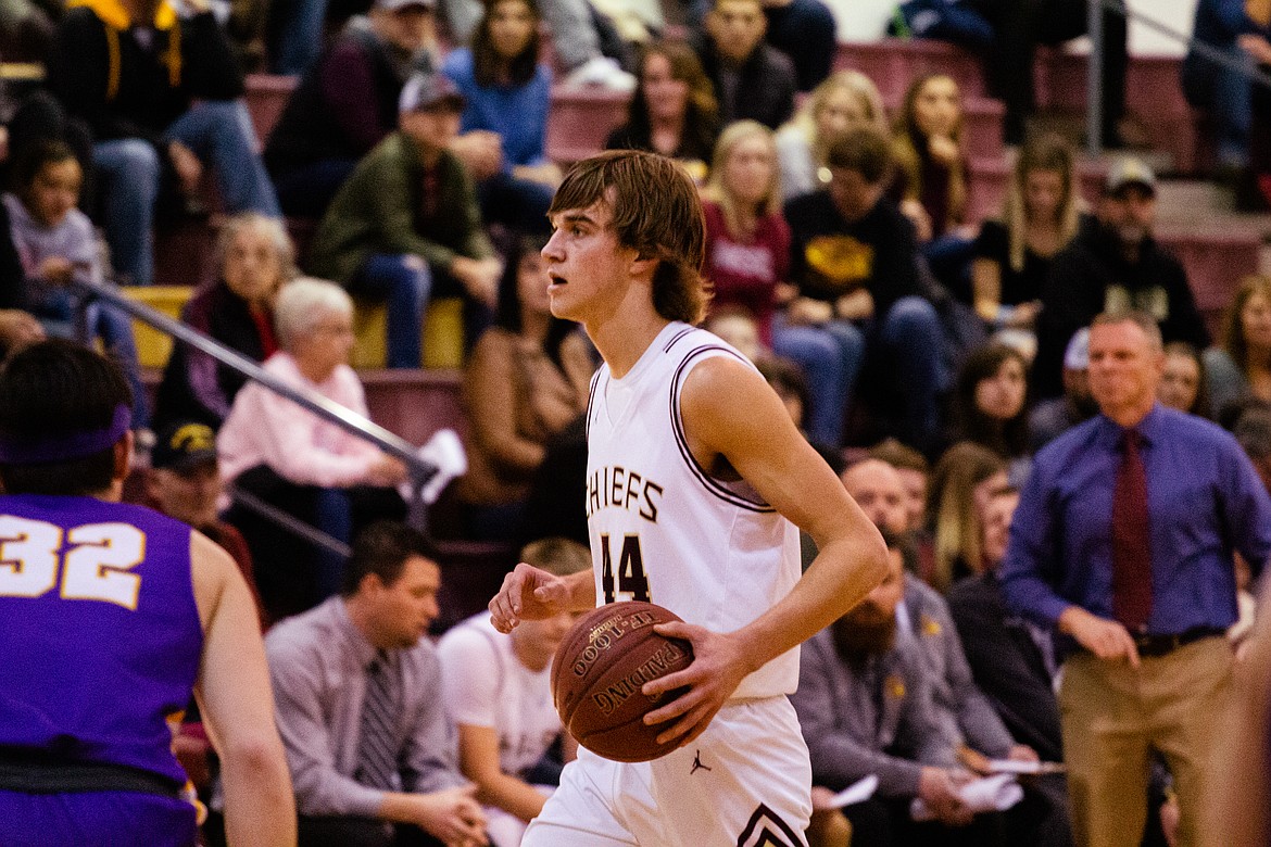 Casey McCarthy/Columbia Basin Herald Moses Lake’s Kyle Karstetter dribbles up the floor on Friday night against Issaquah, the Chiefs’ final game of 2019.