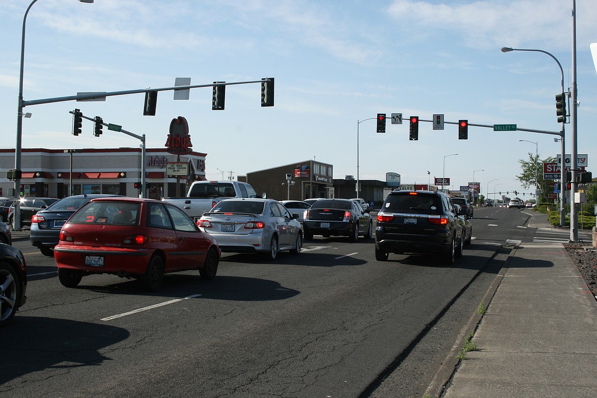 Traffic moves through the intersection at Stratford Road and Valley Road Thursday evening. The intersection will be widened during construction that starts July 6.
