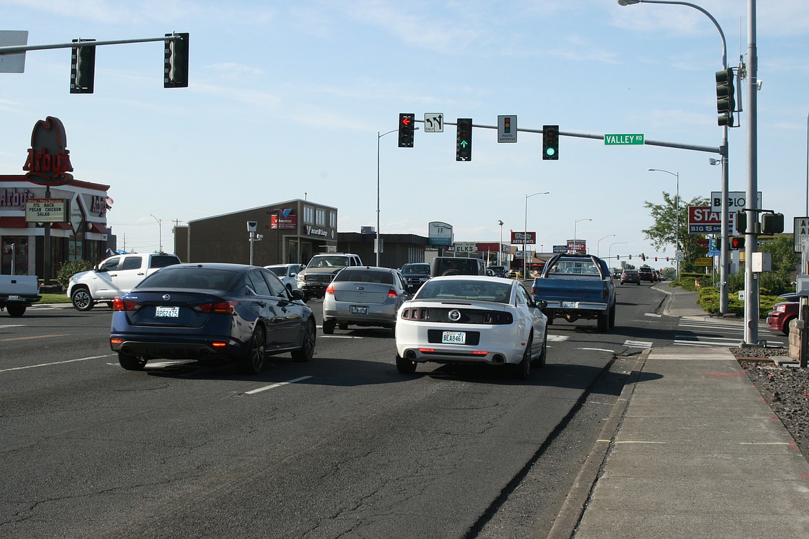 Traffic moves through the intersection at Stratford Road and Valley Road Thursday evening. The intersection will be widened during construction that starts July 6.