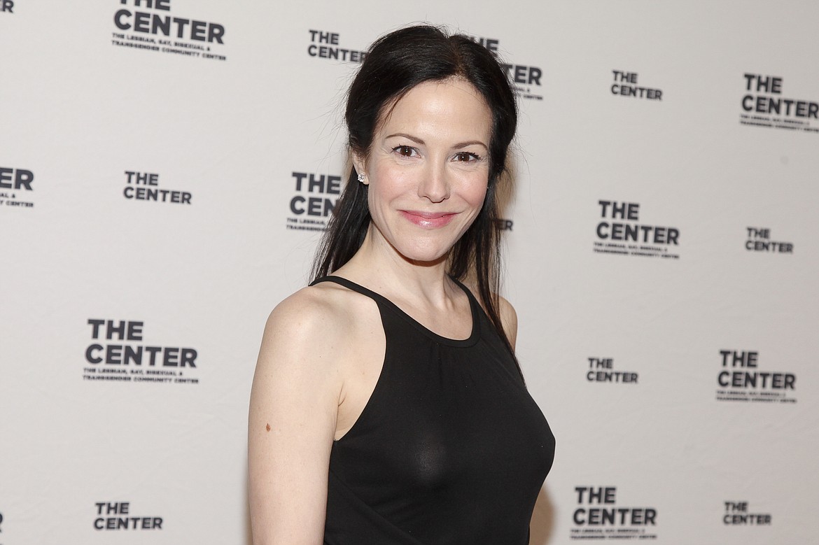 FILE - In this April 2, 2015 file photo, Mary-Louise Parker attends the 2015 Center Dinner benefit gala in New York. Parker is returning to Broadway this fall in the quirky, romantic play &#147;Heisenberg.&#148; Manhattan Theatre Club said Tuesday, Feb. 2, 2016, it will transfer Simon Stephens&#146; drama to its Samuel J. Friedman Theatre in September. (Photo by Andy Kropa/Invision/AP, File)