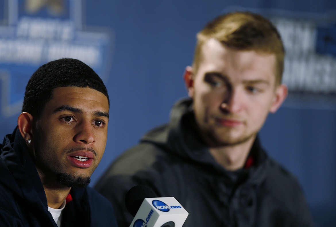 Gonzaga guard Josh Perkins, front, responds to questions as center Domantas Sabonis looks on during a news conference as the team prepares for a second-round men's college basketball game Friday, March 18, 2016, in the NCAA Tournament in Denver. Utah will face Gonzaga on Saturday. (AP Photo/David Zalubowski)