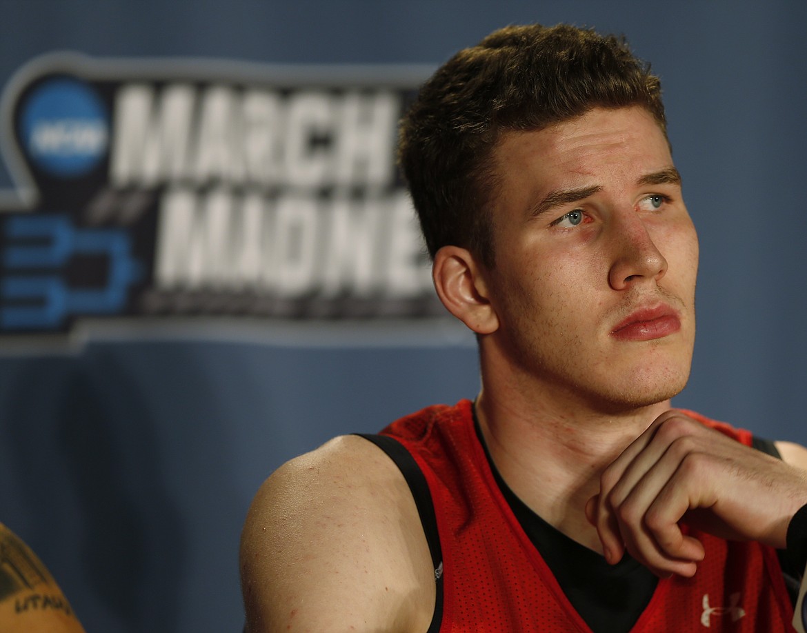 Utah center Jakob Poeltl considers a question during a news conference as the team prepares for a second-round men's college basketball game Friday, March 18, 2016, in the NCAA Tournament in Denver. Utah will face Gonzaga on Saturday. (AP Photo/David Zalubowski)