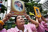 Gripped by grief, Thais mourn death of beloved monarch