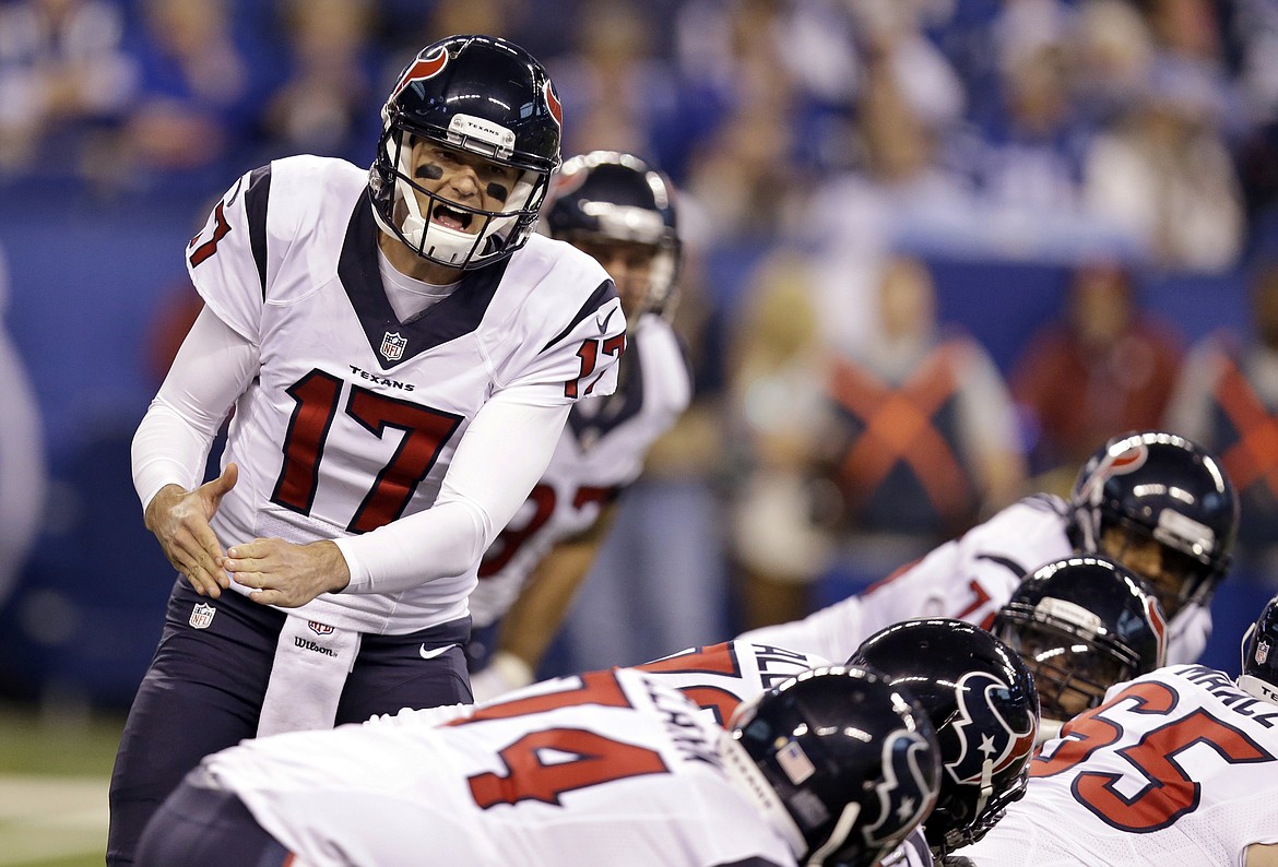 FILE - In this Dec. 11, 2016, file photo, Houston Texans quarterback Brock Osweiler yells on the line of scrimmage during the first half of an NFL football game against the Indianapolis Colts in Indianapolis. Osweiler is getting a second chance to start for the Houston Texans. With Tom Savage still in the concussion protocol the Texans will look to their $72 million man to lead them in their wild-card playoff game against Oakland on Saturday.  (AP Photo/Michael Conroy, File)