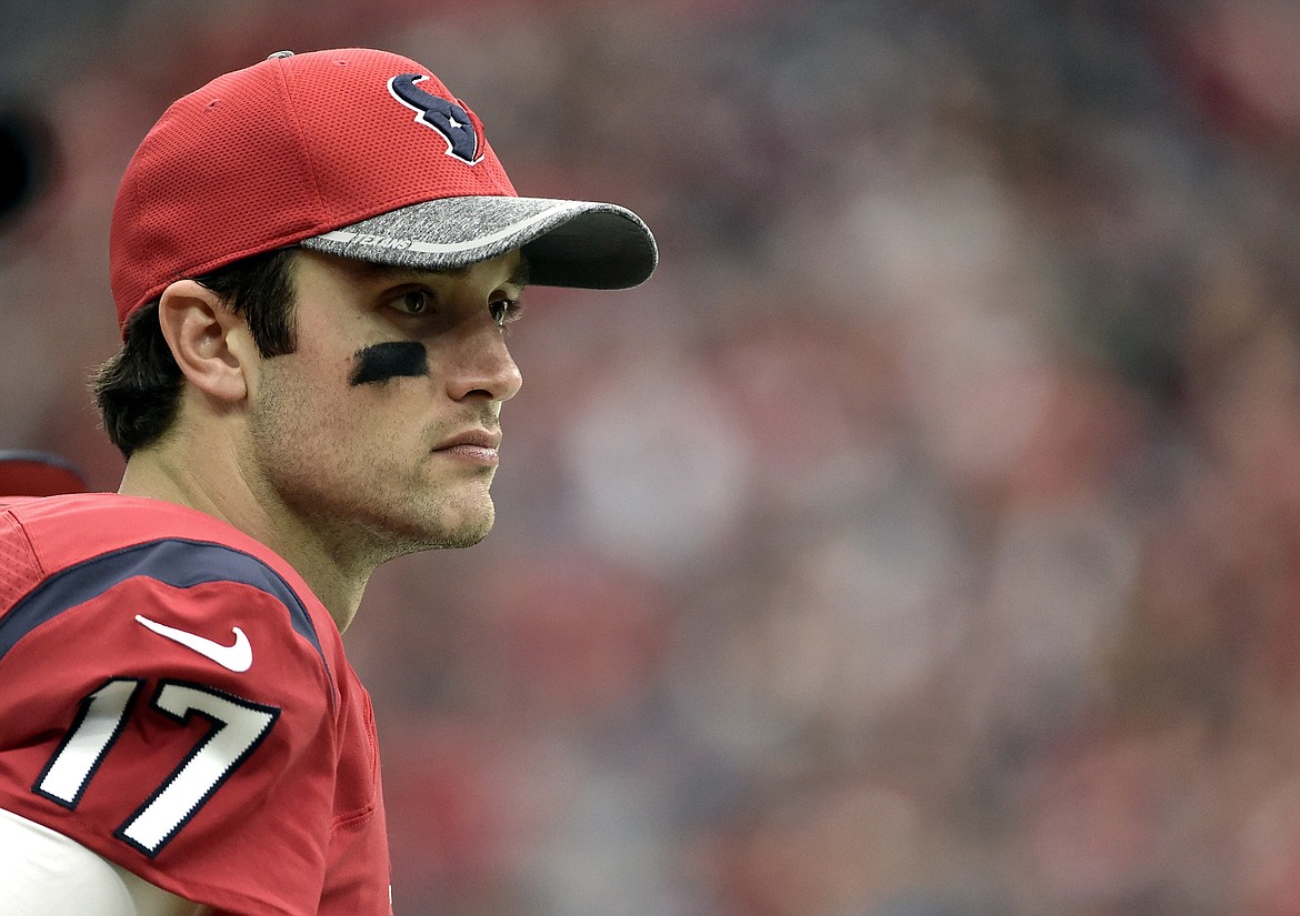 FILE- In this Dec. 18, 2016, file photo, Houston Texans quarterback Brock Osweiler (17) watches the offense from the sidelines during the first half of an NFL football game against the Jacksonville Jaguars in Houston. Osweiler is getting a second chance to start for the Houston Texans. With Tom Savage still in the concussion protocol the Texans will look to their $72 million man to lead them in their wild-card playoff game against Oakland on Saturday. (AP Photo/Eric Christian Smith, File)