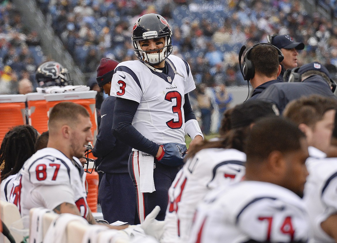 Houston Texans quarterback Tom Savage (3) stands on the sideline after coming back onto the field in the first half of an NFL football game against the Tennessee Titans Sunday, Jan. 1, 2017, in Nashville, Tenn. Savage was taken off the field earlier in the game to be examined after being shaken up on a play. (AP Photo/Mark Zaleski)