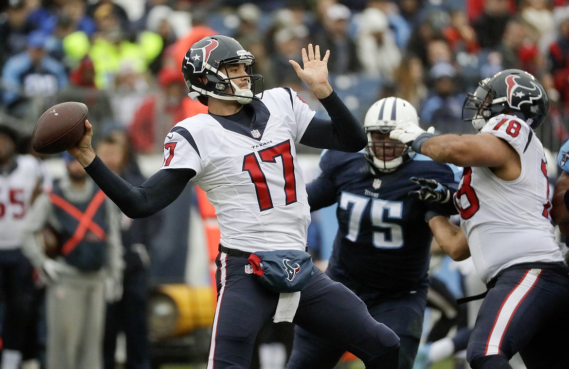 Houston Texans QB Brock Osweiler (17) passes as guard Oday Aboushi (78) blocks Tennessee Titans nose tackle Antwaun Woods (75) during the first half of last Sunday&#146;s NFL game in Nashville, Tenn. (AP Photo/James Kenney)