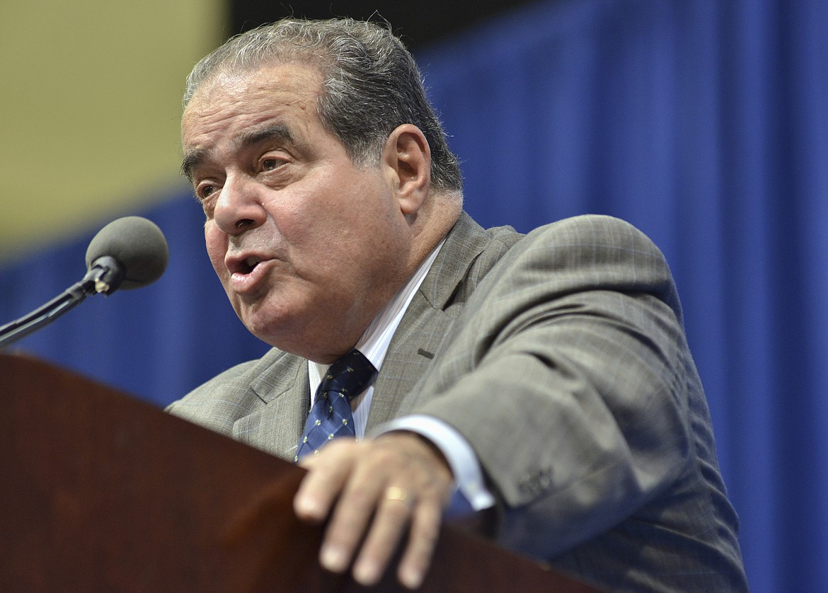 FILE - In this Oct. 2, 2013 file photo, Supreme Court Justice Antonin Scalia speaks at Tufts University in Medford, Mass.  (AP Photo/Josh Reynolds, File)