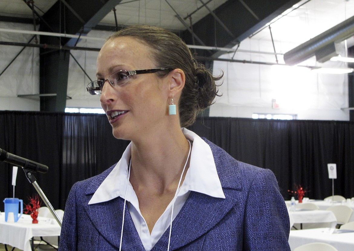 FILE - In this Aug. 16, 2014, file photo, Amanda Curtis speaks before the opening of the Montana Democratic Party&#146;s special nominating convention in Helena, Montana. Curtis, a state legislator from Butte, is seeking the Democratic Party&#146;s nomination in a special election to fill Montana&#146;s seat in the U.S. House which became vacant Wednesday, March 1, 2017, when Republican Ryan Zinke was confirmed as President Donald Trump&#146;s Interior Department secretary. (AP Photo/Matt Volz, File)