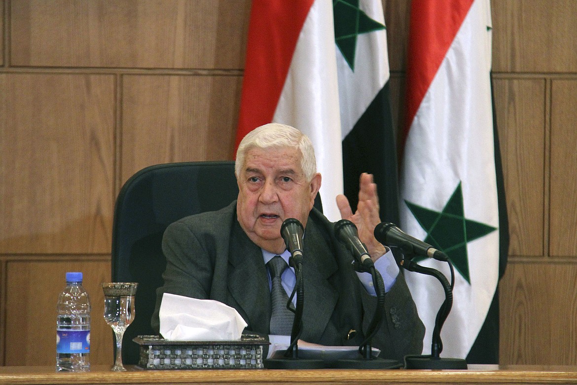 In this photo released by the Syrian official news agency SANA, Syrian Foreign Minister Walid Moallem, speaks during a press conference, in Damascus, Syria, Thursday, April 6, 2017. Moallem told reporters Thursday that it didn&#146;t use chemical weapons in Tuesday&#146;s deadly chemical weapons attack in Syria&#146;s northern Idlib province, and he blamed the rebels for stockpiling the deadly substance. Moallem said any investigative mission would need to take off from Damascus and be far from the sphere of Turkish influence. (SANA via AP)