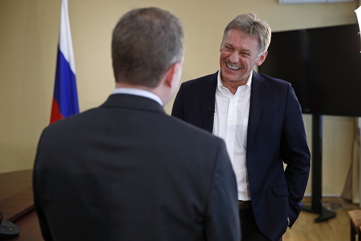 President Vladimir Putin&#146;s spokesman Dmitry Peskov, right, speaks with Ian Phillips, vice president International News Associated Press, during a meeting with The Associated Press in Moscow, Russia, Thursday, April 6, 2017.  Peskov told The Associated Press that Russia&#146;s support for Syrian President Bashar Assad is not unconditional, with Putin&#146;s Spokesman talking just days after a suspected chemical weapons attack on a Syrian rebel-held province.(AP Photo/Pavel Golovkin)
