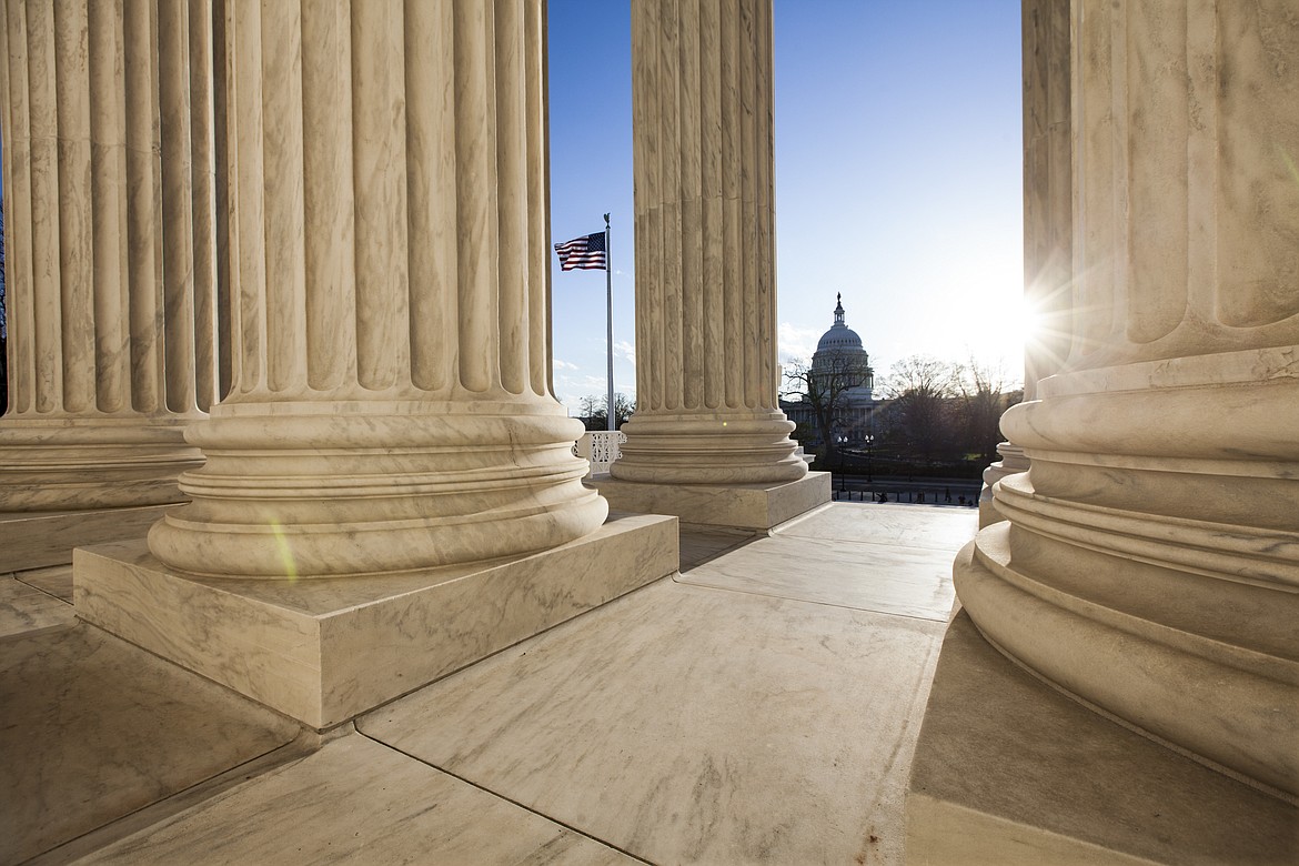 In this photo taken on, Tuesday, April 4, 2017, the Capitol in seen from the Supreme Court Building in Washington. A Democratic senator held the Senate floor through the night and was still going Wednesday in an attention-grabbing talk-a-thon highlighting his party's opposition to President Donald Trump's Supreme Court nominee, Neil Gorsuch. (AP Photo/J. Scott Applewhite)