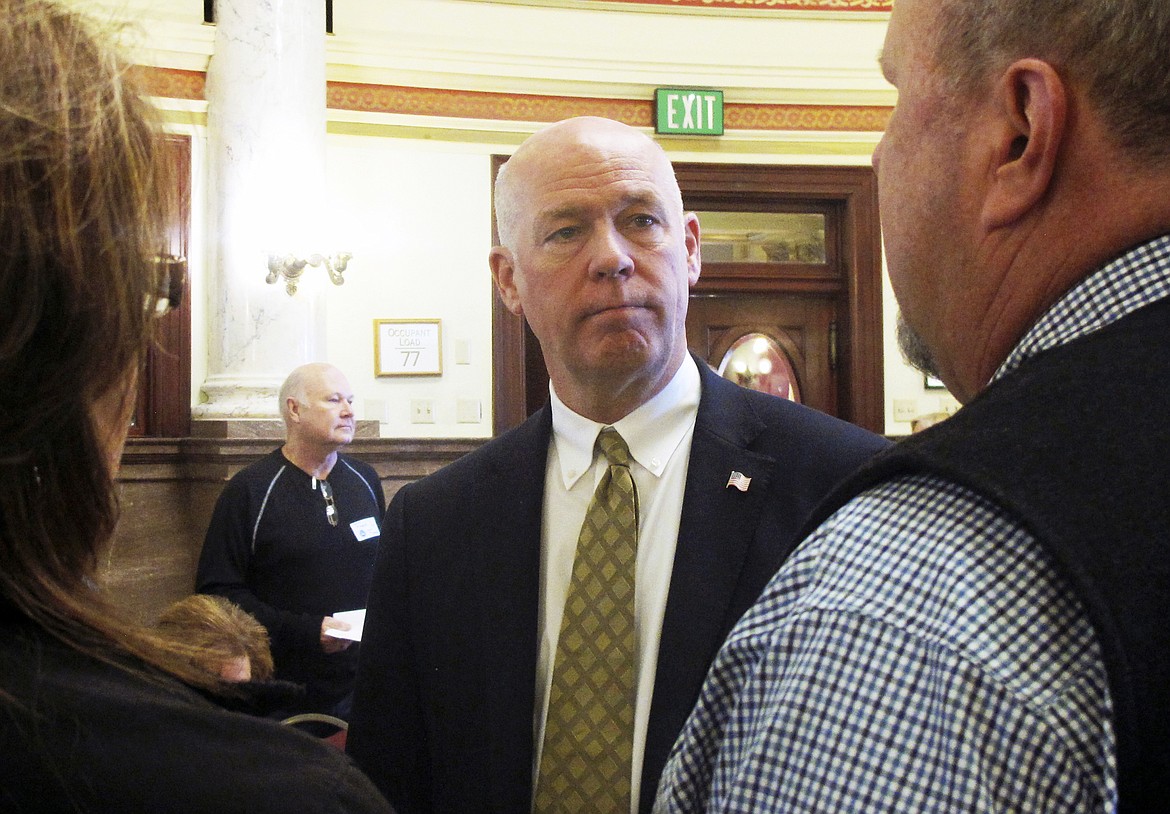 FILE - In this March 6, 2017 file photo technology entrepreneur Greg Gianforte speaks to Republican delegates before a candidate forum in Helena, Mont. Gianforte won Montana&#146;s only U.S. House seat on Thursday, May 25, despite being charged a day earlier with assault after witnesses said he grabbed a reporter by the neck and threw him to the ground. (AP Photo/Matt Volz, File)