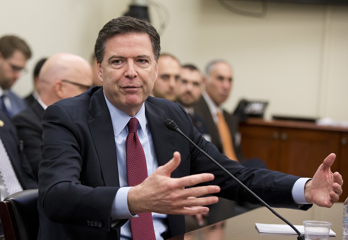 FILE - In this Feb. 25, 2016, file photo, then-FBI Director James Comey, testifies before a House Commerce, Justice, Science, and Related Agencies Subcommittee budget hearing about the Federal Bureau of Investigation&#146;s FY 2017 budget, on Capitol Hill in Washington. Comey will testify that President Donald Trump sought his &#147;loyalty&#148; and asked what could be done to &#147;lift the cloud&#148; of investigation shadowing his White House, according to prepared remarks released ahead of his appearance on Capitol Hill on June 8, 2017. (AP Photo/Manuel Balce Ceneta)