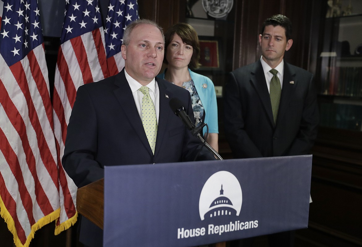 In a photo from Tuesday, June 13, 2017, House Majority Whip Steve Scalise, R-La., joined by Speaker of the House Paul Ryan, R-Wis., far right, and Rep. Cathy McMorris Rodgers, R-Wash., comments on health care for veterans during a news conference at Republican National Committee Headquarters on Capitol Hill in Washington. (AP Photo/J. Scott Applewhite)