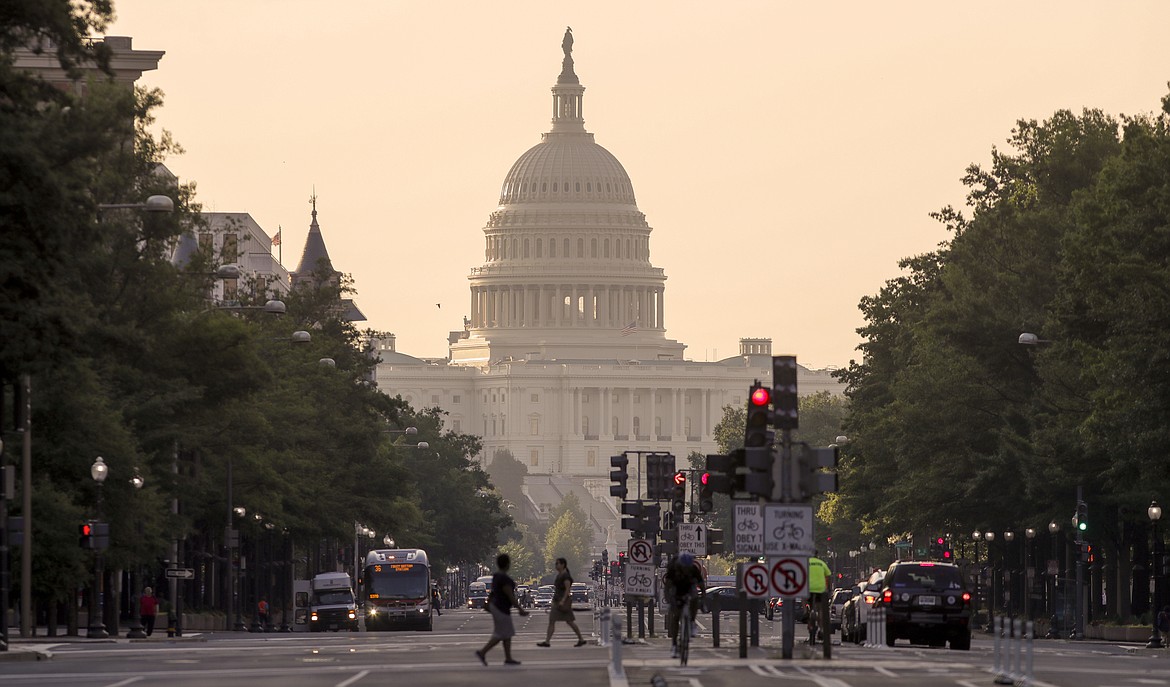 The Capitol in Washington is seen early Thursday, July 13, 2017, as Senate Majority Leader Mitch McConnell of Ky. prepares to roll out the GOP's revised health care bill, pushing toward a showdown vote next week with opposition within the Republican ranks. (AP Photo/J. Scott Applewhite)